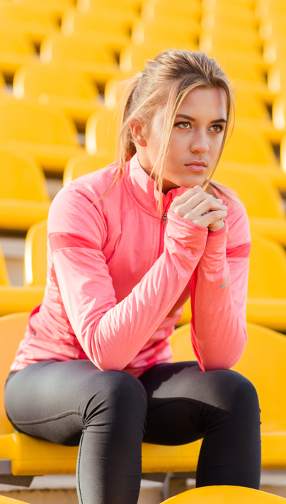 A female athlete thinking